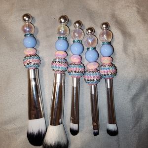 Beaded makeup brushes